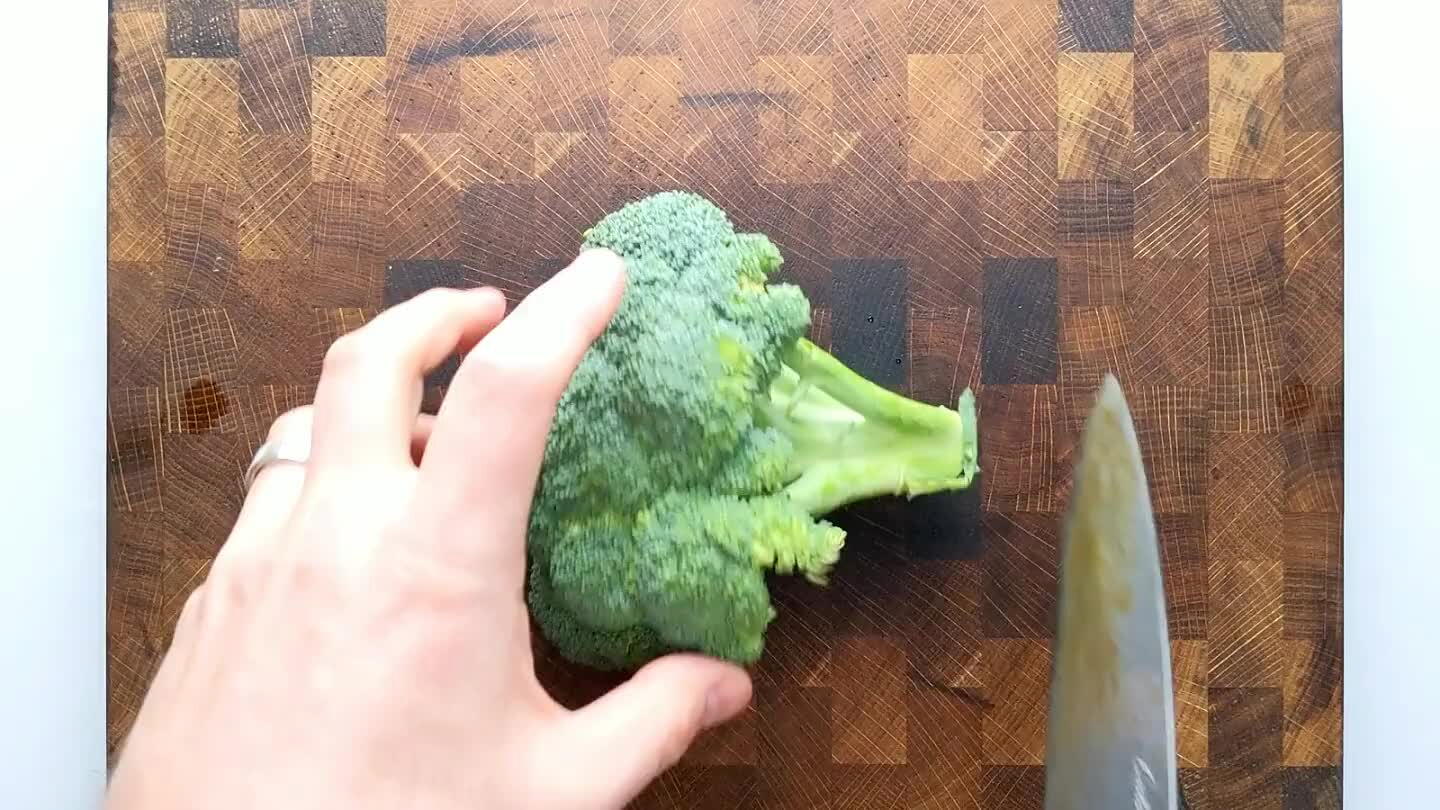 the end of the stem and then, by slicing from the stem towards the leaves, divide the brocolli crown into chunks.