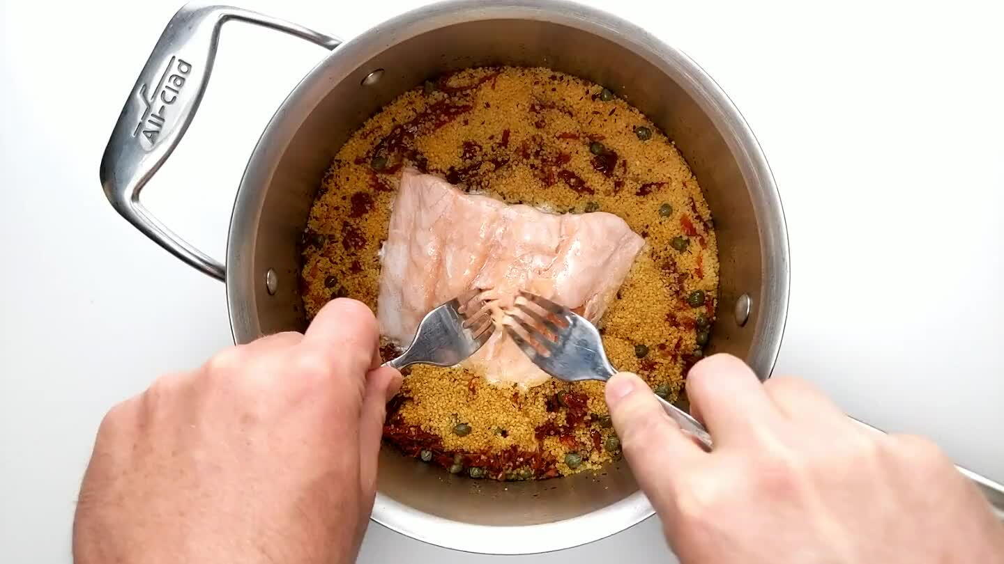 nicely steamed with a little pink in the center. You can either serve the salmon on a bed of couscous or flake it into the couscous as a salad. This dish is also great cold.