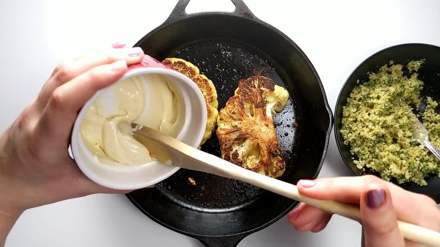 se and mustard mixture. Spoon half of the breadcrumb mixture onto each cauliflower steak.