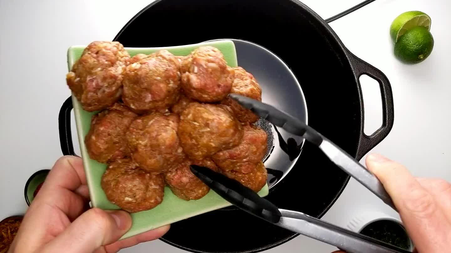the pan. Brown each of the meatballs on 2 opposite sides, then transfer them to a dish lned with paper towels to drain.