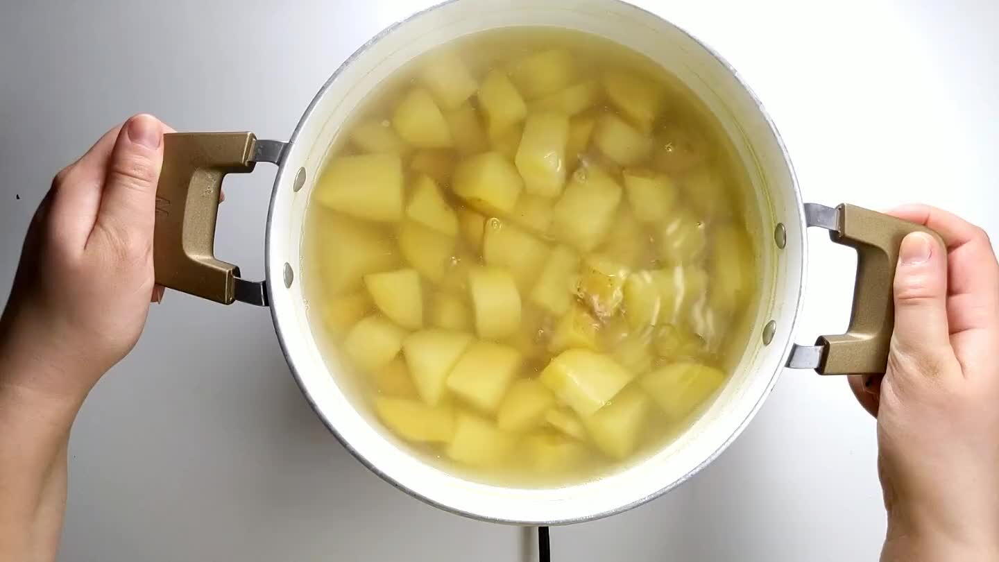 ain the potatoes in a colander and return to the pot.