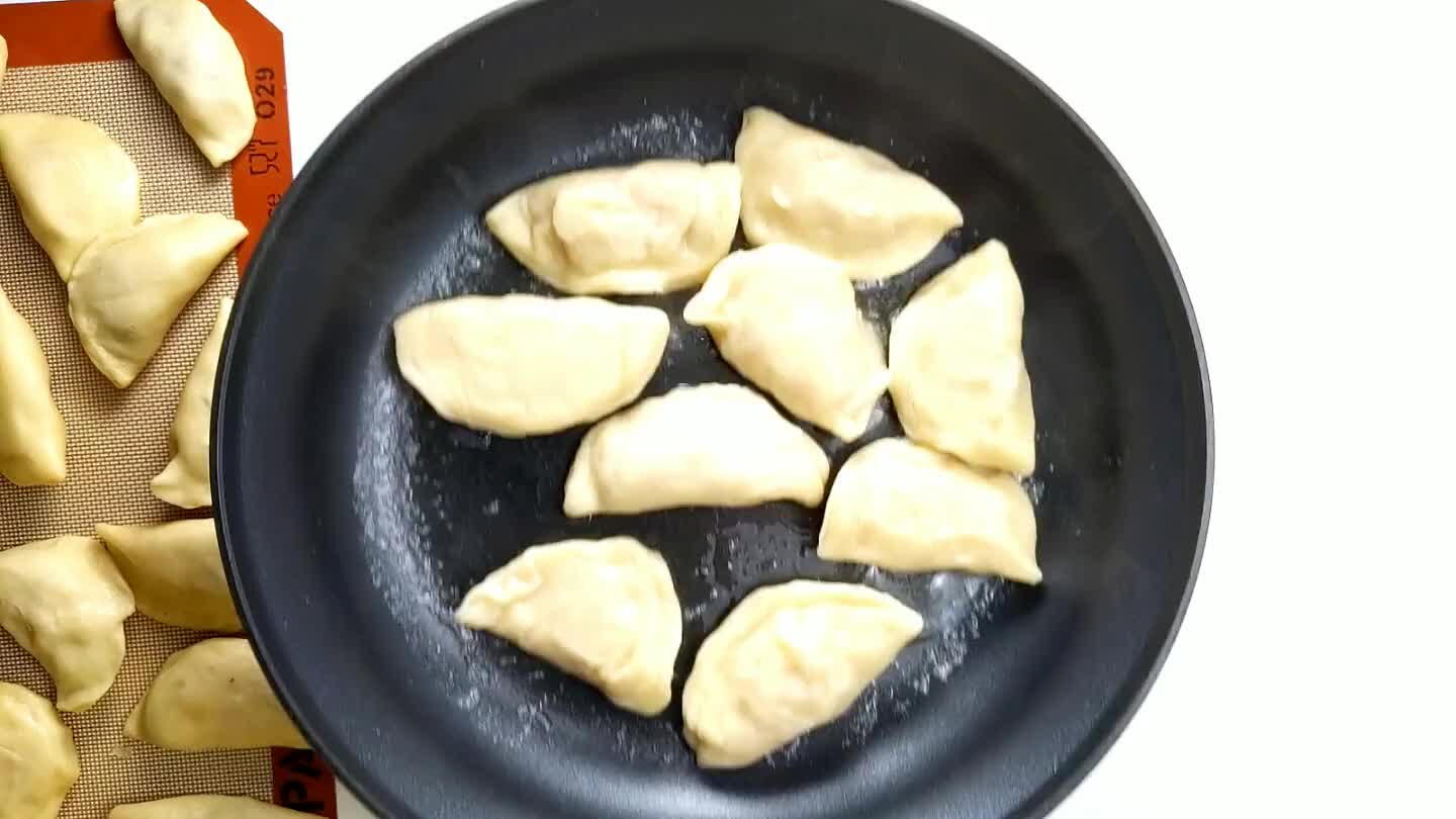 pierogis. Fry for a few minutes on each side until browned and crispy.