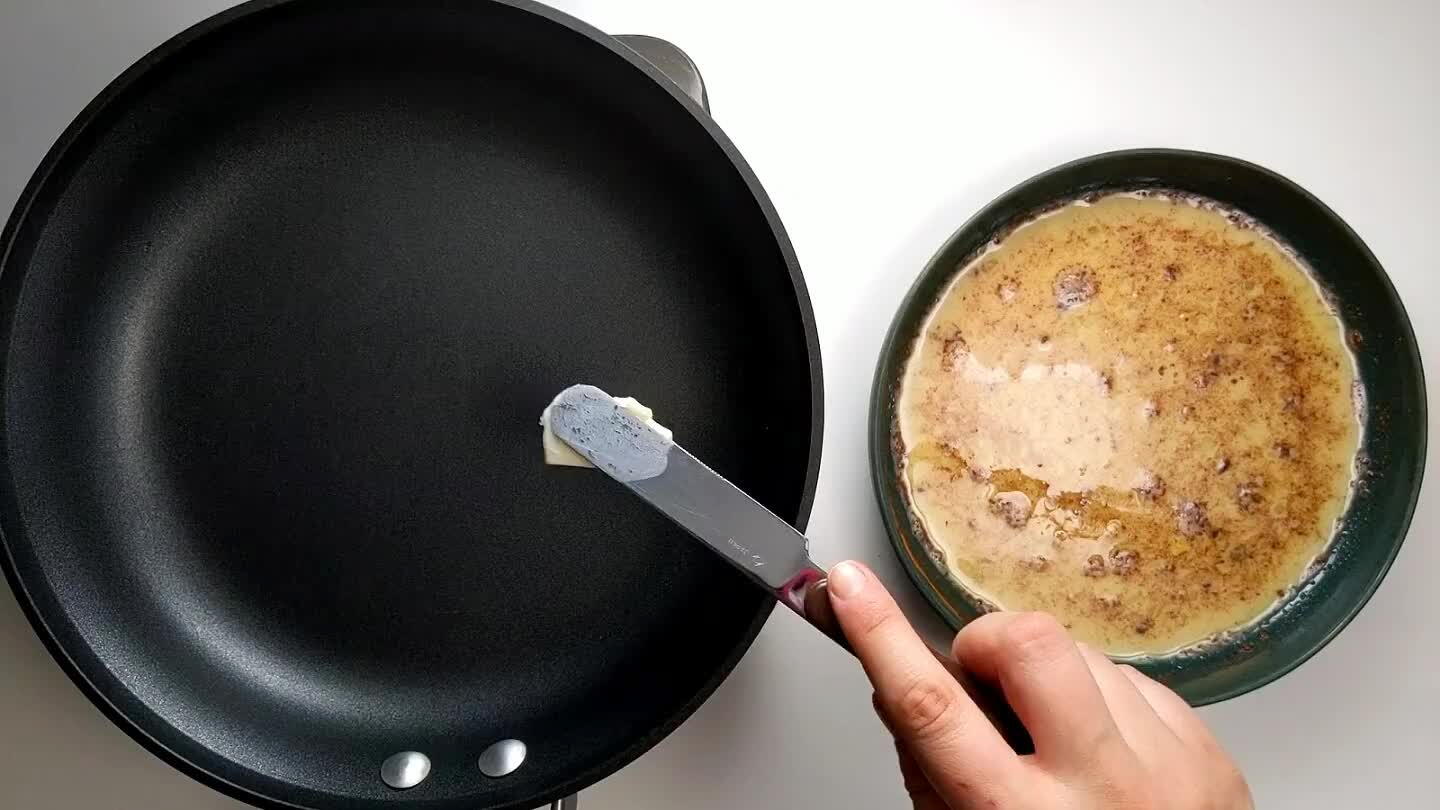 an. While the butter melts, soak the bread in the egg mixture on both sides so that it becomes a bit soggy. Lay gently into the pan. Repeat with as many slices as fit on the pan.