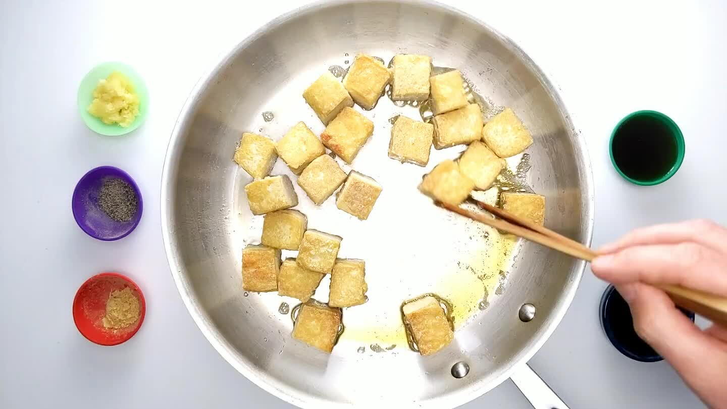 uce. Tilt the pan a little to get the oil to pool in the clear space. Stir in the crushed garlic.