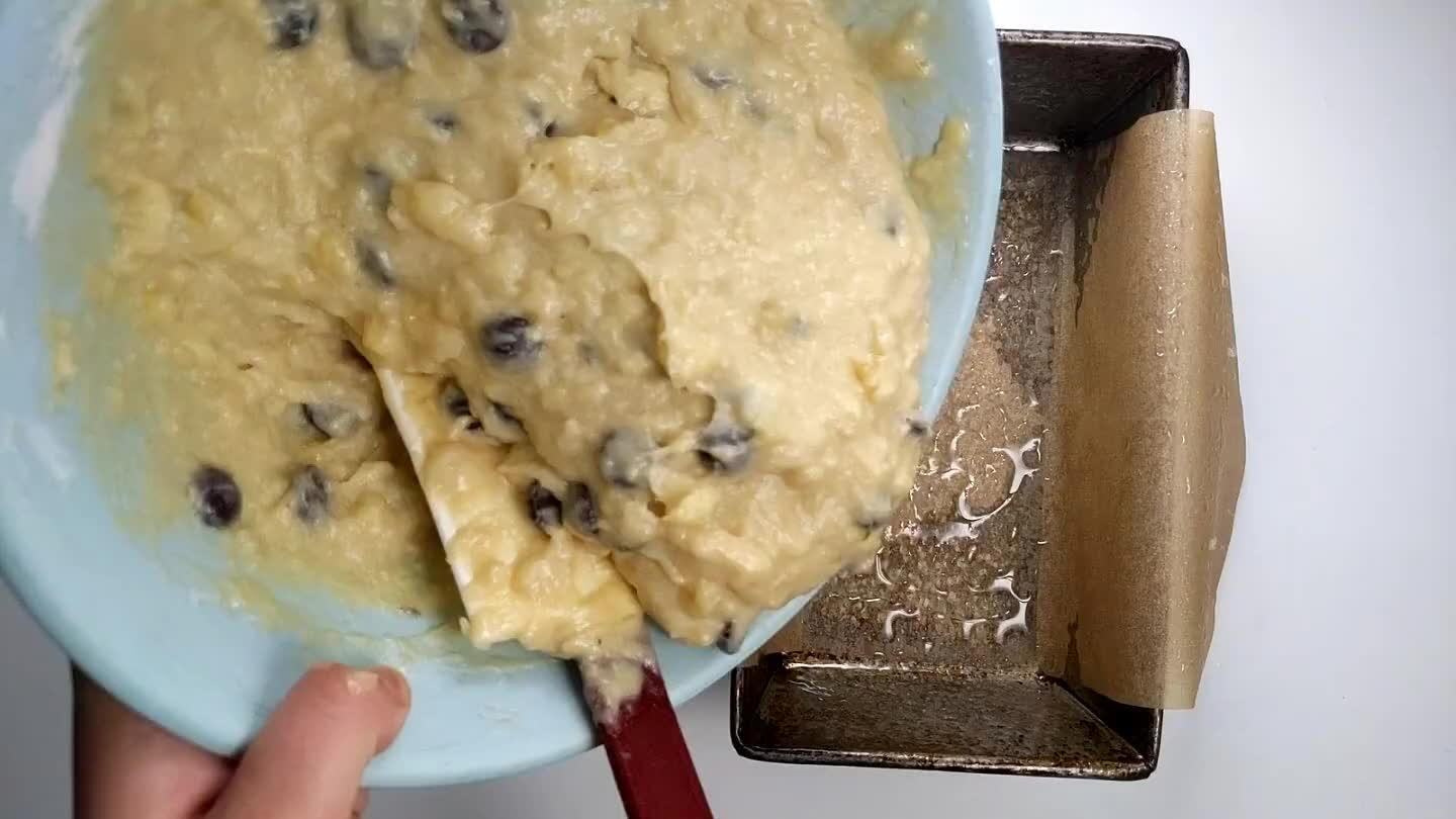 Check the bread for done-ness by poking with a toothpick. If it comes out clean, the bread is done.