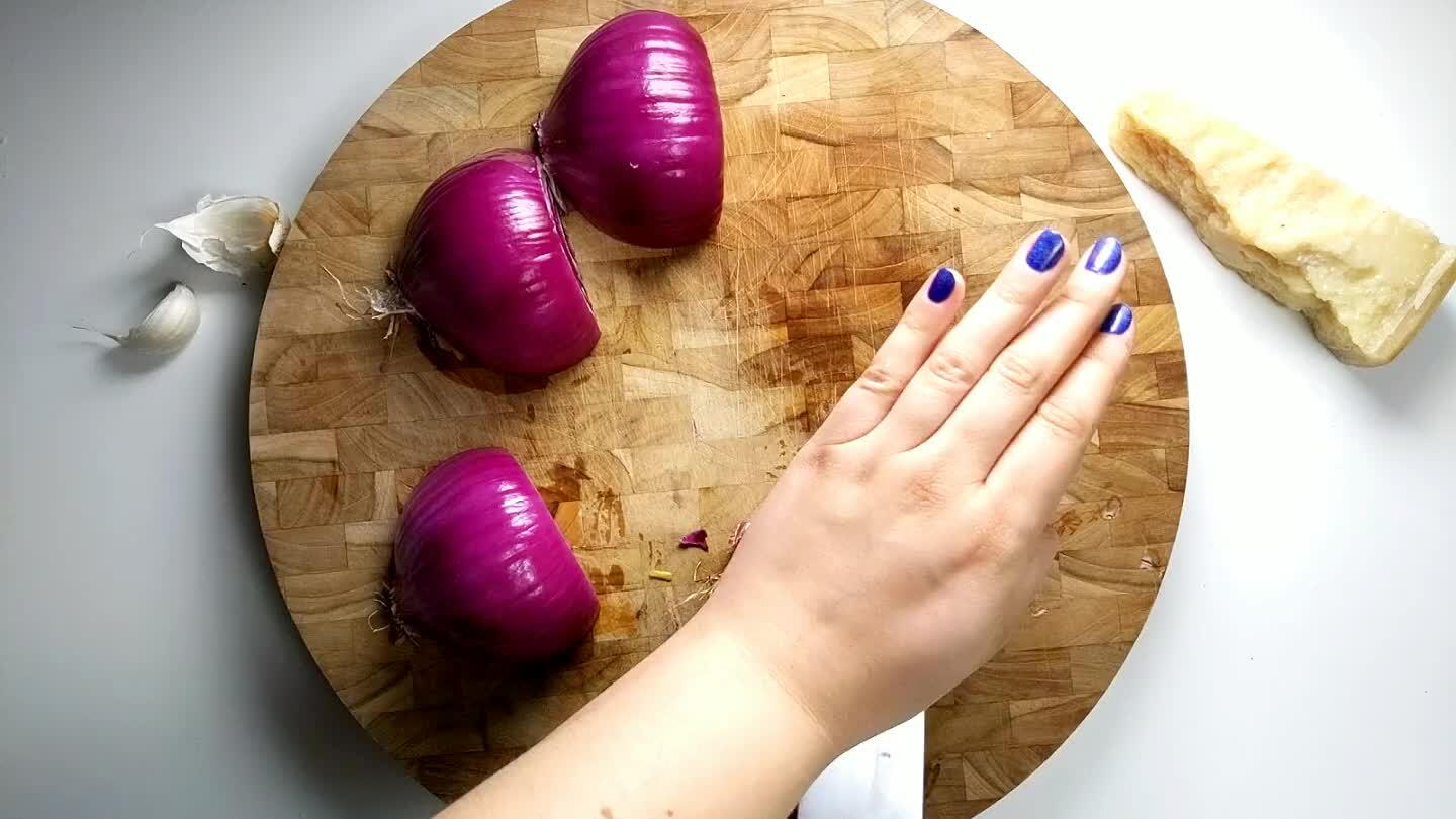 o the cutting board. Then cut down across the onion to create slices. Cut across the slices, holding firmly onto the root side of the onion to create a fine dice.