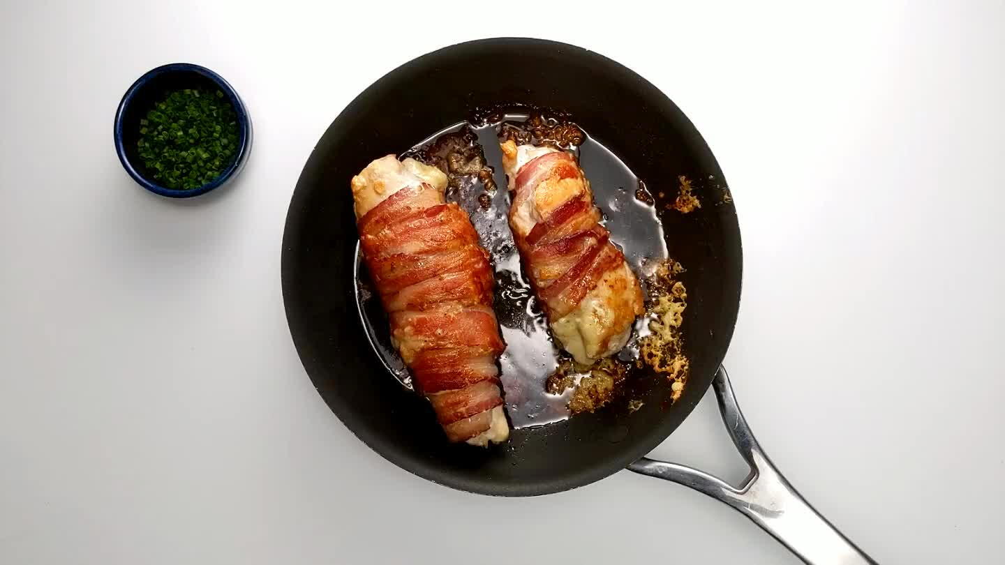most insulated region hits a temperature of 165°F. If you're within a few degrees, you can remove the chicken from the pan and give it 5-10 minutes before slicing to coast up to that finish line.