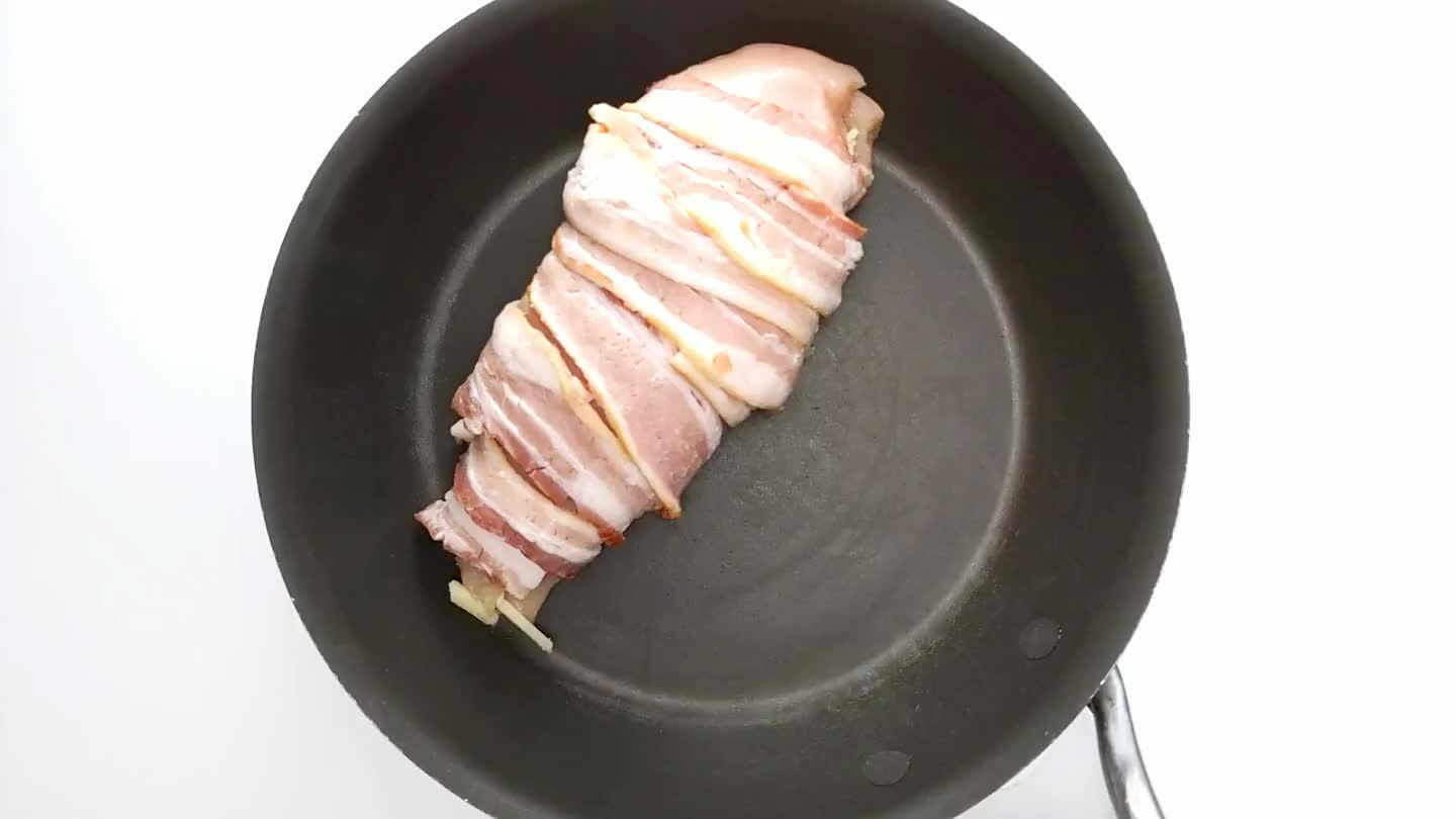 frequently, until the strips of bacon are golden and crisp all around. This will probably take some doing to balance the cutlets on their narrower sides. Alternatively, you can also bake these for about 20 minutes at 450°F.