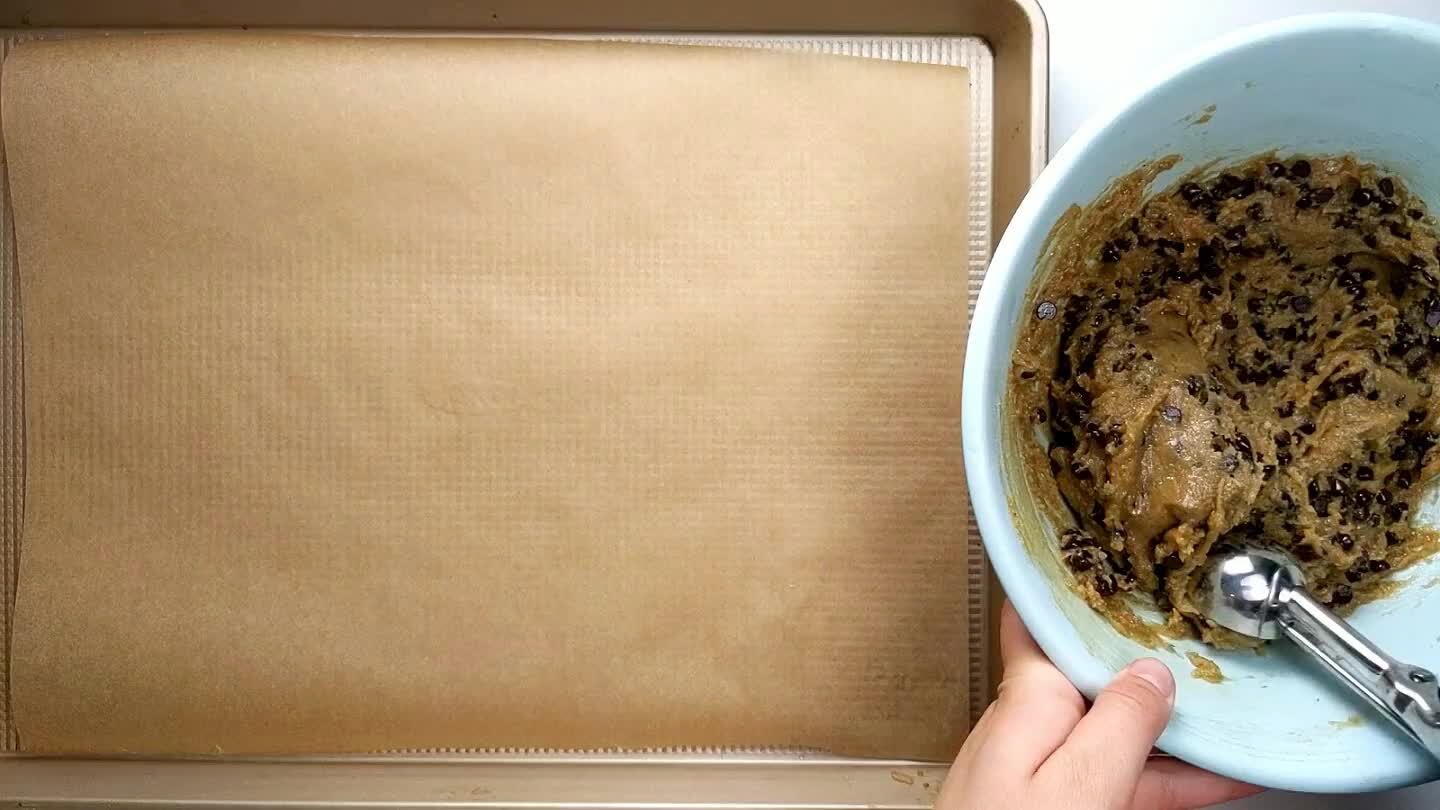sheet lined with parchment paper.