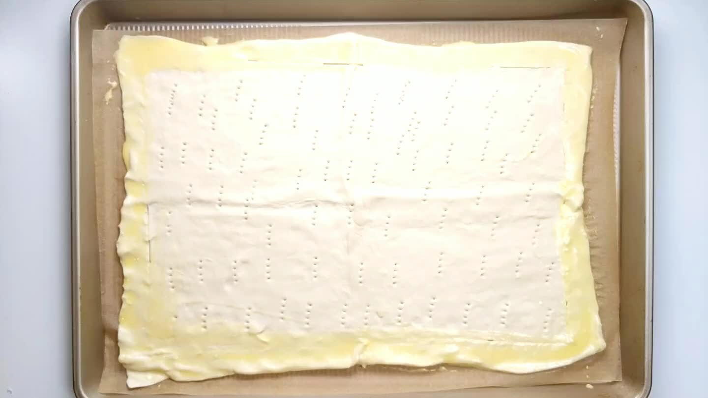 bottom of the pastry. Bake for 12 minutes. If it puffs up a lot in the middle, you may need to prick the pastry again to release the air.