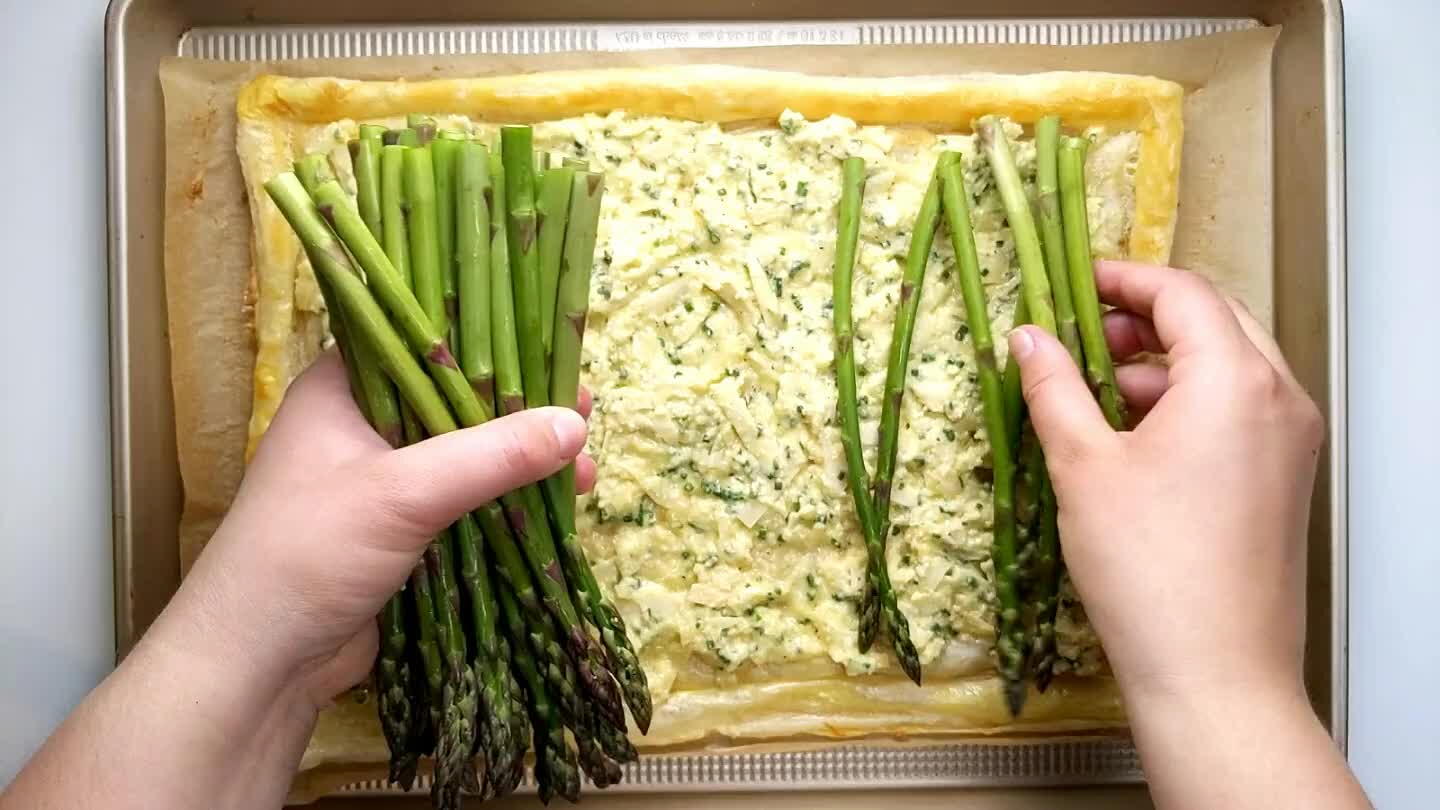press lightly into the filling. Drizzle with with olive oil to coat the asparagus.