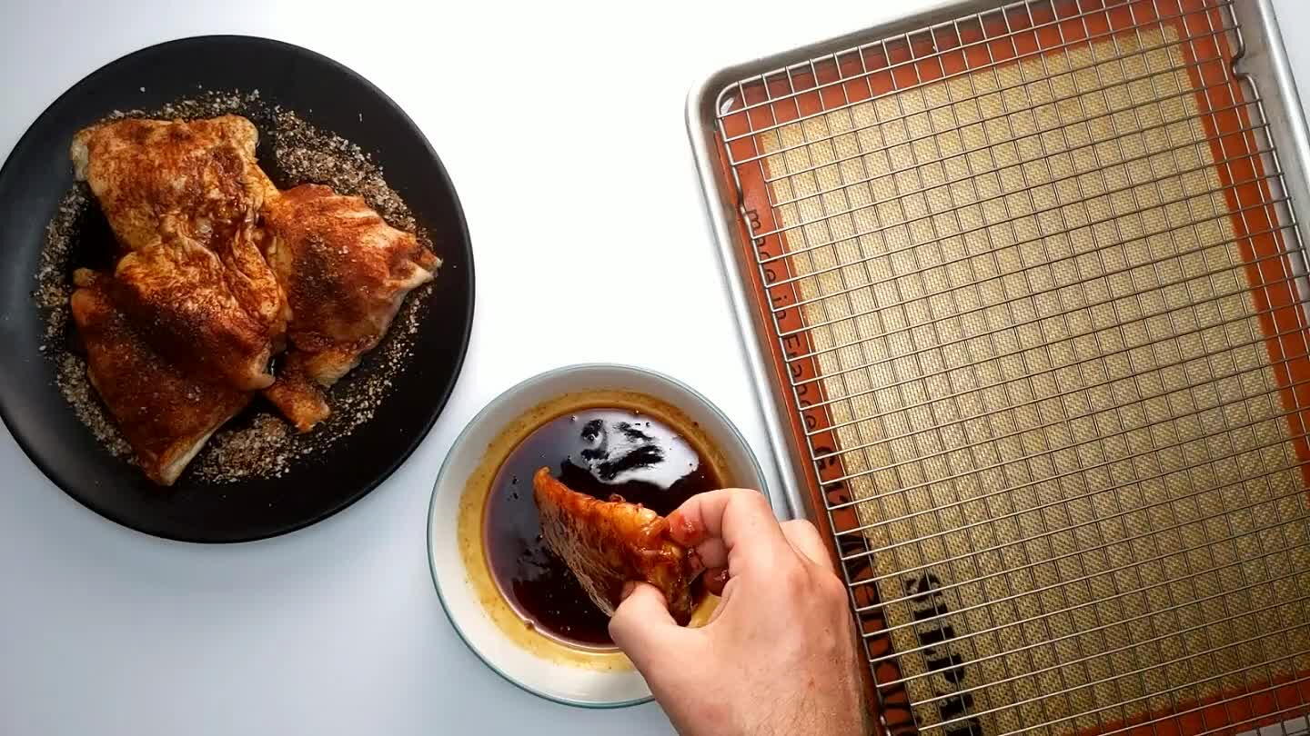Obviously, barbecue chicken would call for a barbecue, but these really roast well too. If you're planning on roasting, preheat the oven to 450°F. A rack will improve airflow. Lining the pan will help avoid a lot of cleanup.