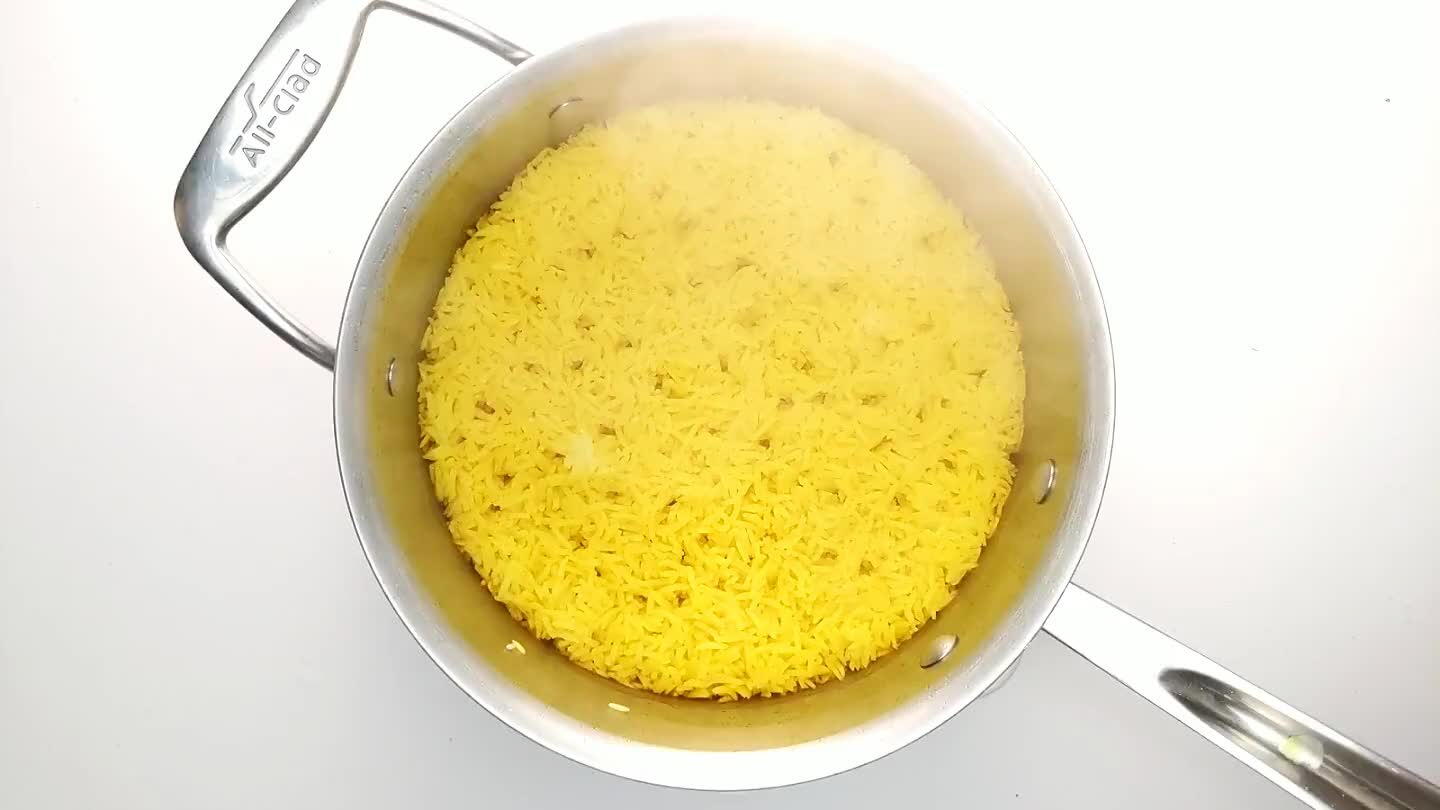 water is fully absorbed. If not, you can replace the lid and continue cooking.