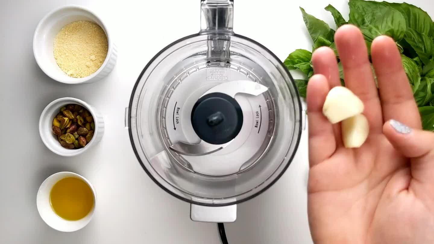 o a food processor. Remove any thick stems from the basil. You will want about 1 1/2 cups basil leaves.