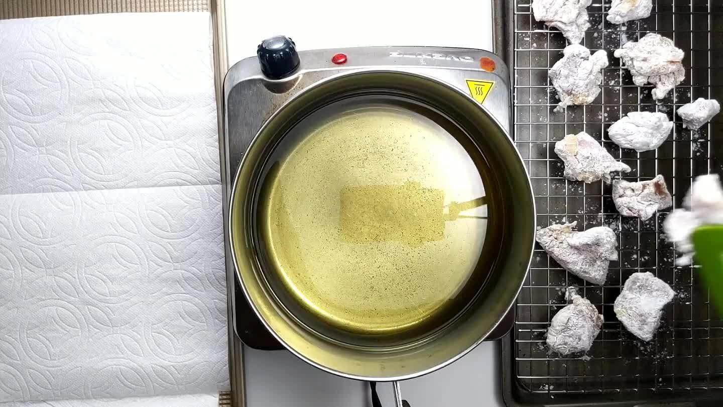 Keep the oil between 325°F and 350° while frying. Do not overcrowd the pot or the oil temp will go down too much.