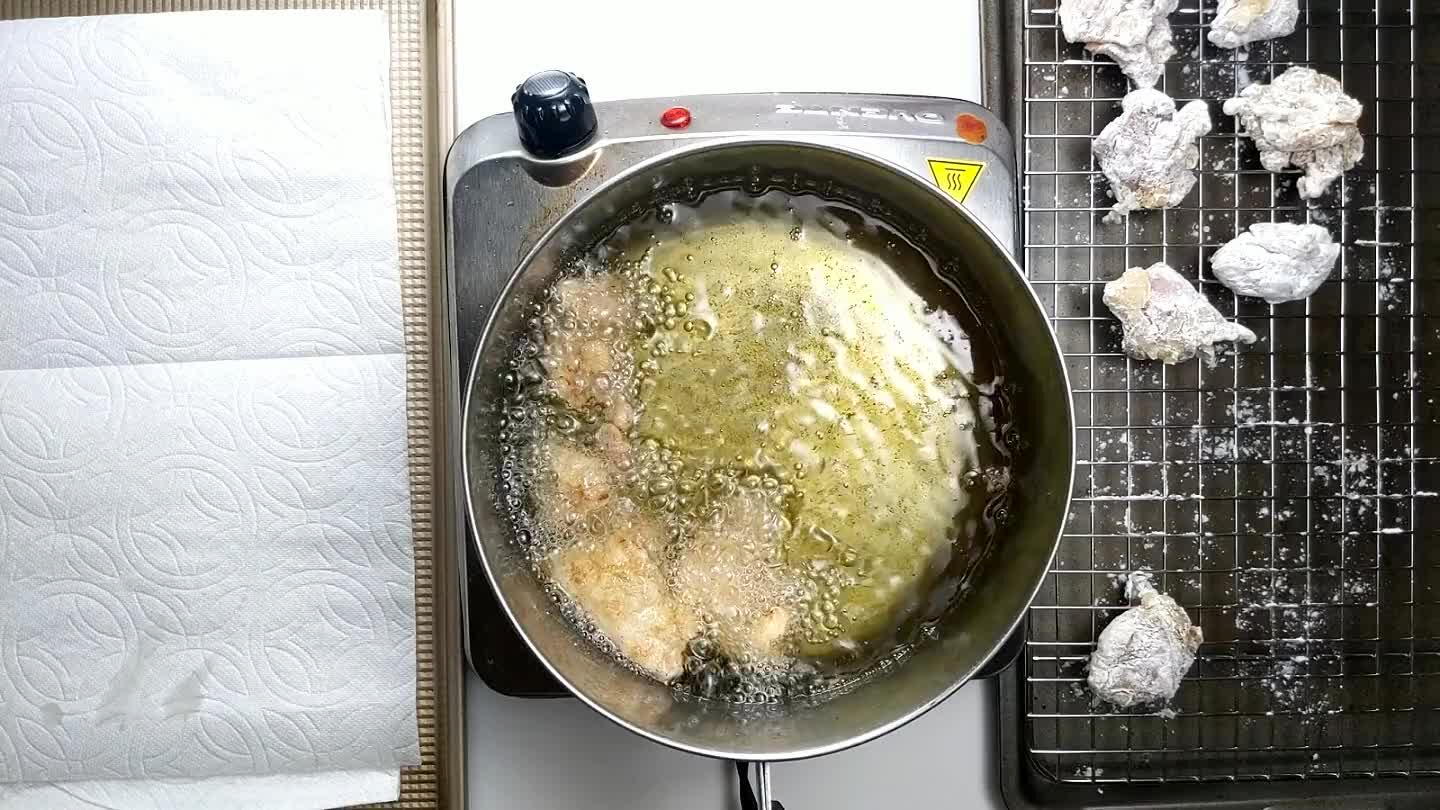 st of the chicken making sure the oil temp stays above 325°F.