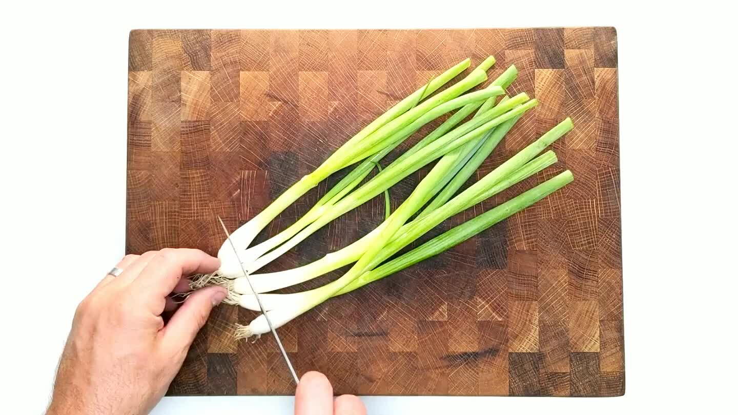 s to fade. Gather the green portions up in a bundle and slice thin. Set aside the white portions. We'll use those too.