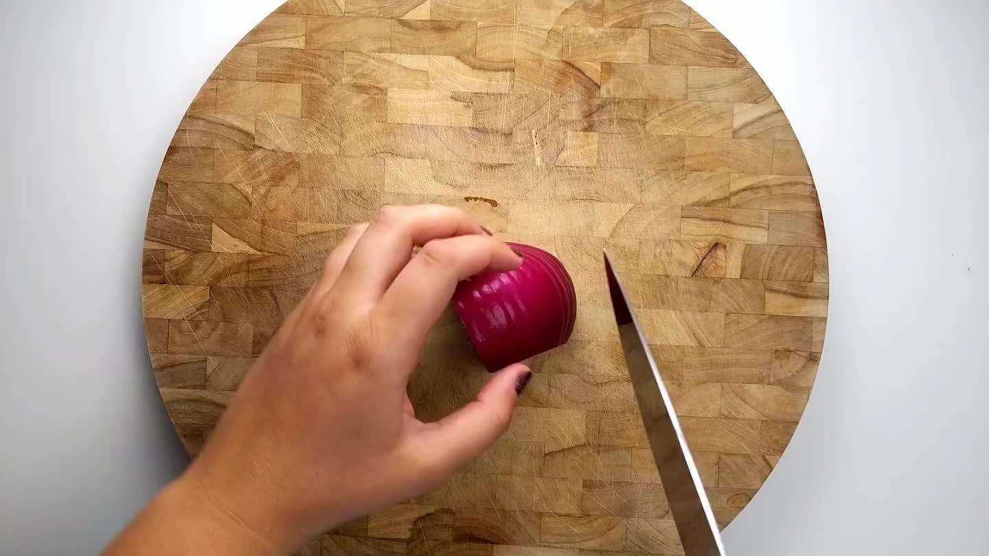 t side in-tact, cut the onion into slices. Cut two times into the cut side of the onion with the knife parallel to the cutting board. Finely dice.