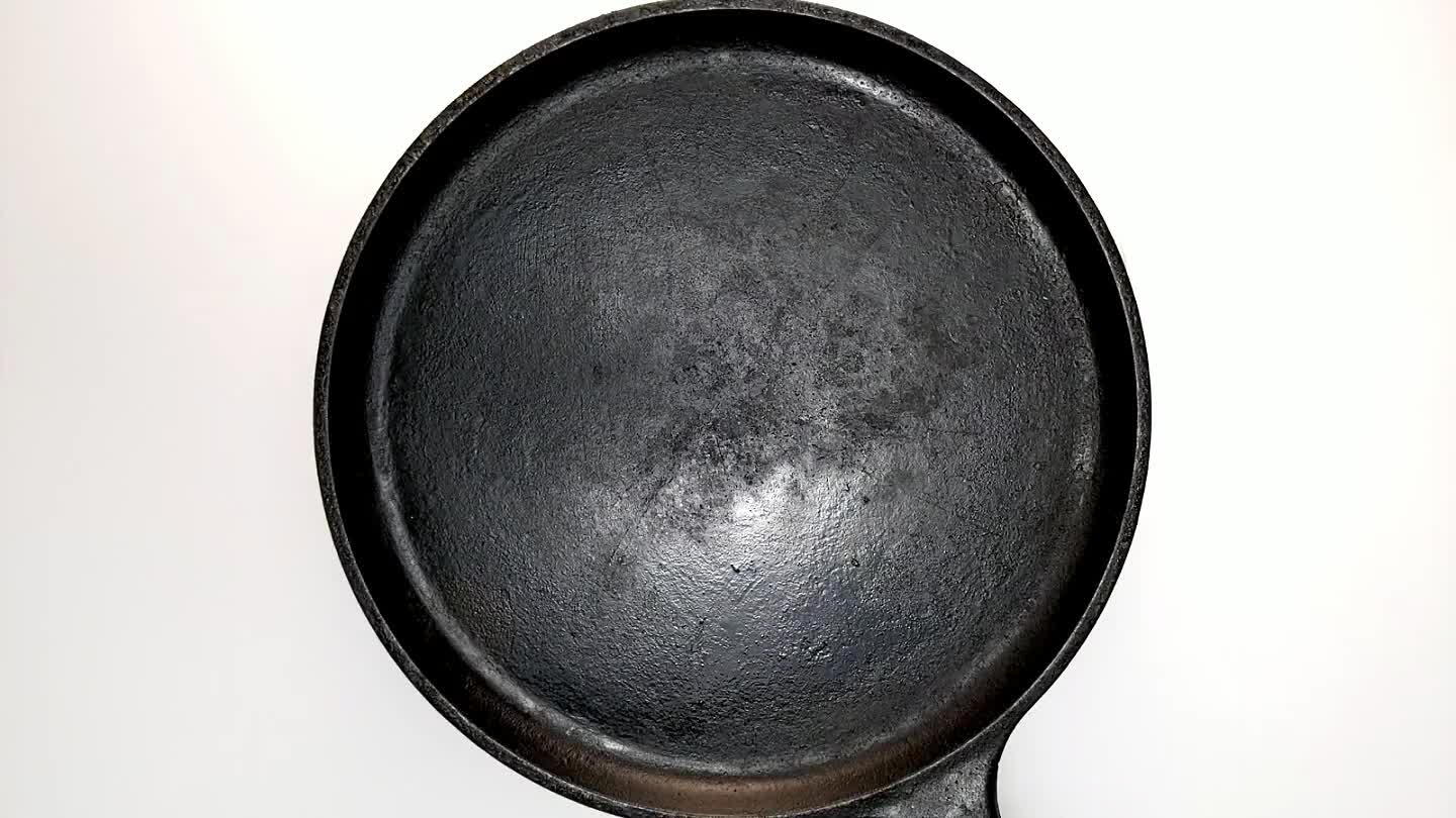 heat. It's helpful to keep a folded paper towel on hand to wipe the oil cleanly over the pan without puddling.