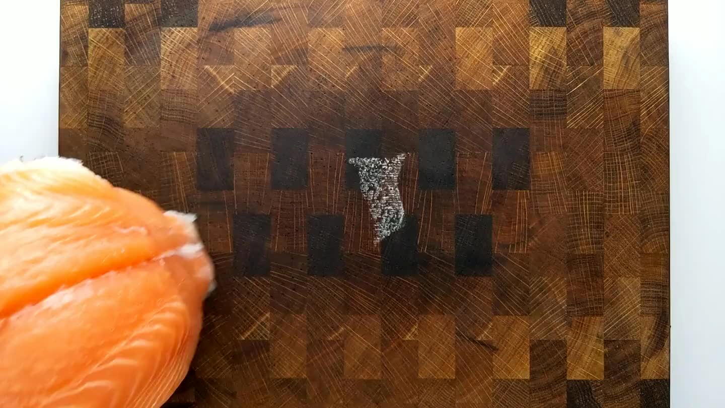flesh. Gently pull any pin bones from the fillet using tweezers. Flip the fillet and scrape with a knife blade or a fish scaler against the grain of the scales. Rinse in salted water to make sure all of the scales are removed.