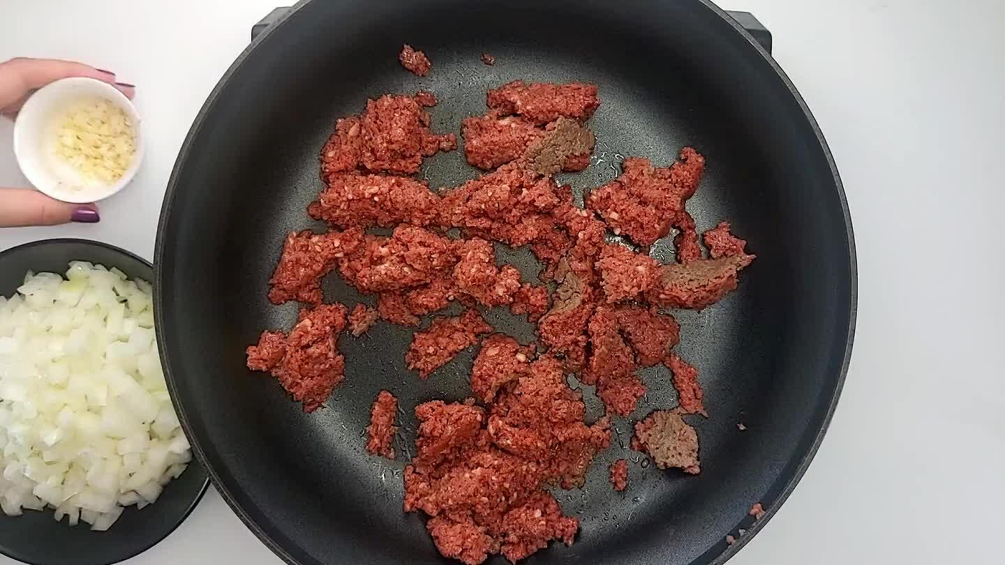 d meat. Saute until meat is browned and onion is translucent.
