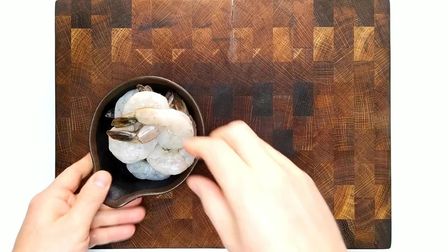 the vein if present. Slice the halves as thin as possible.