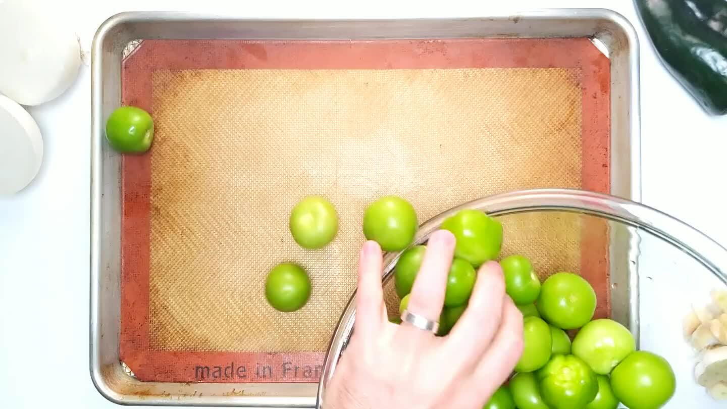 , garlic and green chiles on the baking sheet.