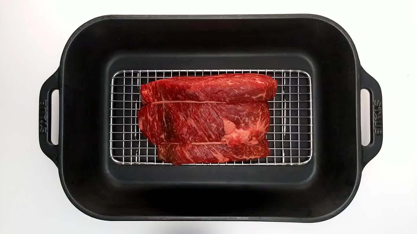 ome air to flow around the meat works fine. Coat the roast in salt and pepper.