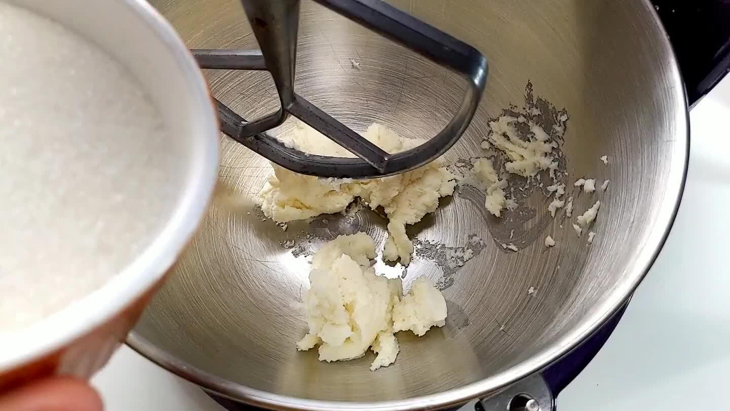 beat the shortening and sugar together for a few minutes, scraping down the sides a few times. It should be light in color and fluffy.