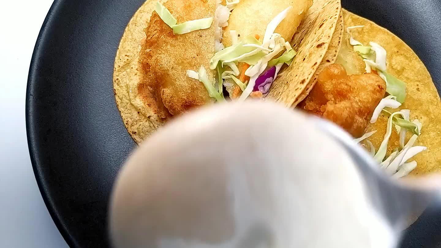 and top with a dollop of lime-cumin sour cream.