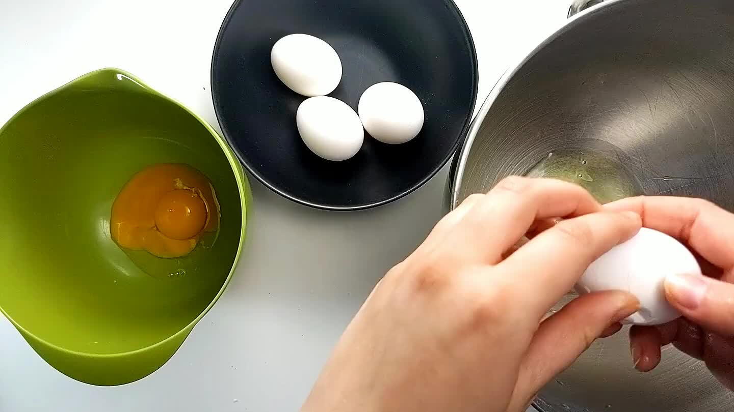 of a stand mixer, and the yolks to a medium sized mixing bowl.