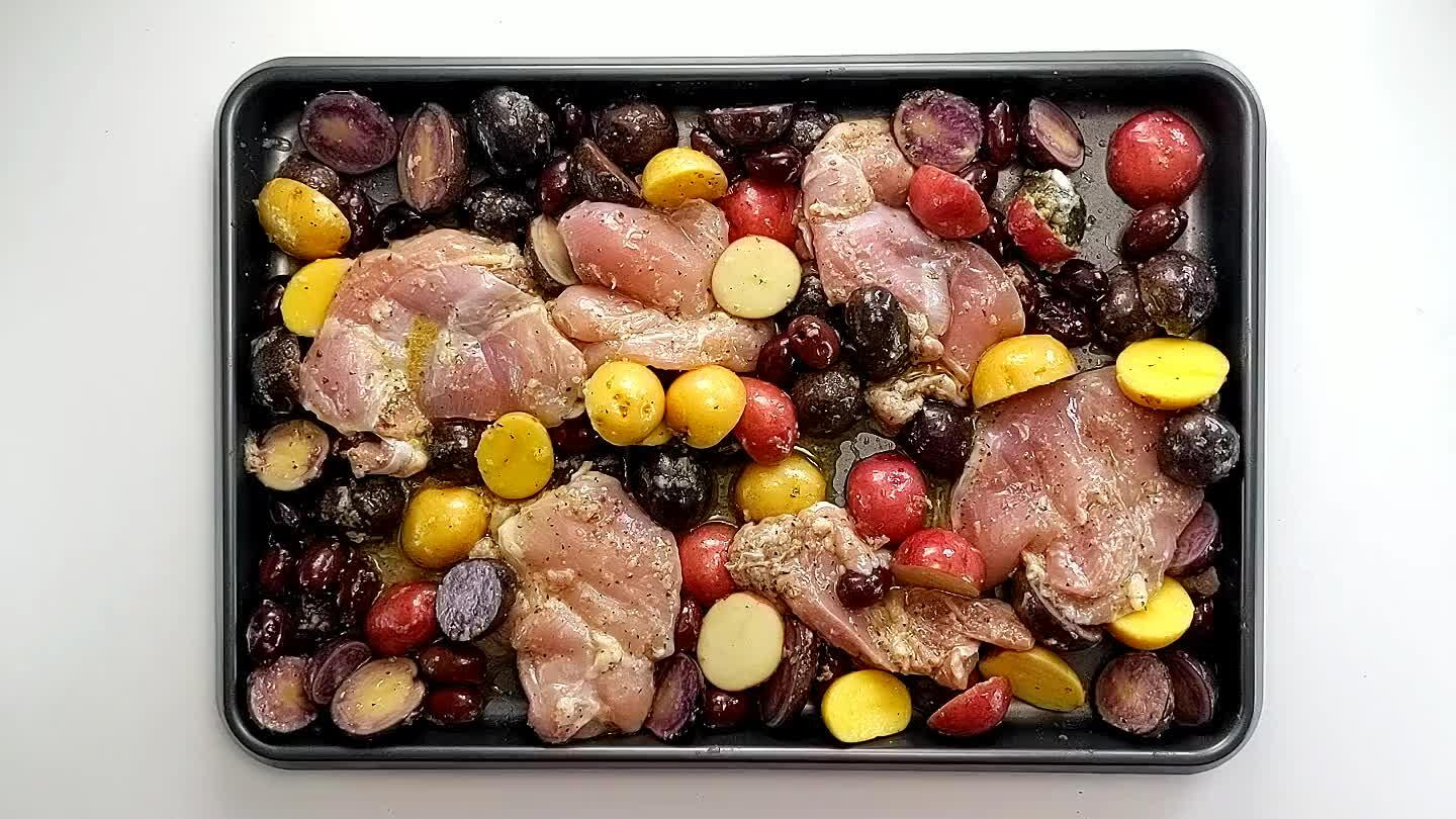 ches 165 and the potatoes are cooked through. If you like, roast lemon slices along with the chicken or garnish with fresh lemon slices.