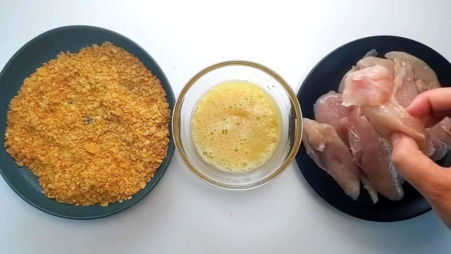 e one hand for the egg and the other hand for the cornflakes to keep your hands as clean as possible!