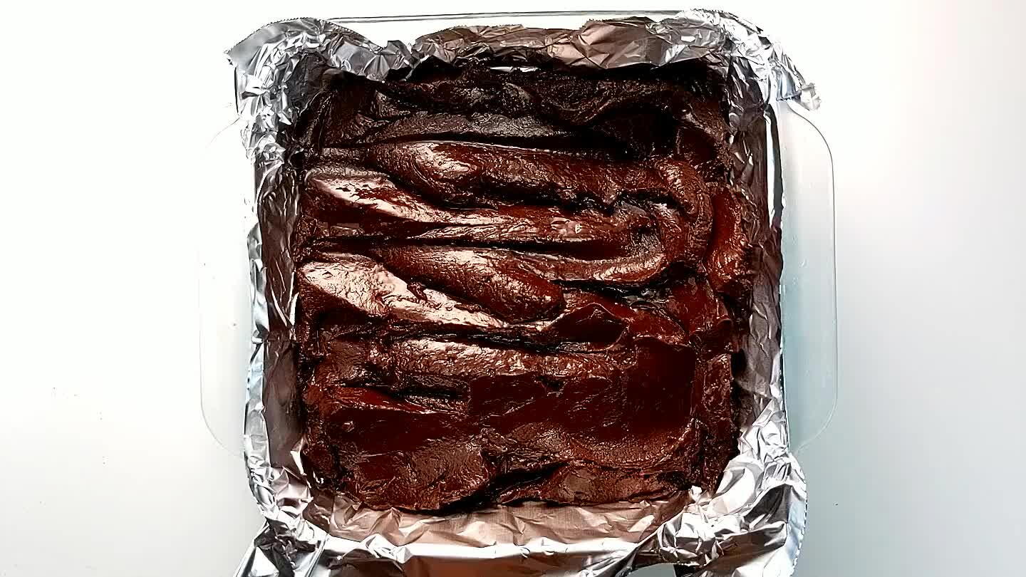 Refrigerate for a couple hours or until the fudge is firm. Slice into bite sized cubes for serving.