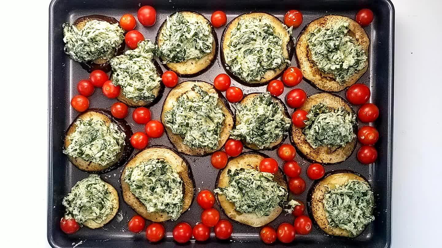 eesy topping has melted a bit and the tomatoes are bursting.