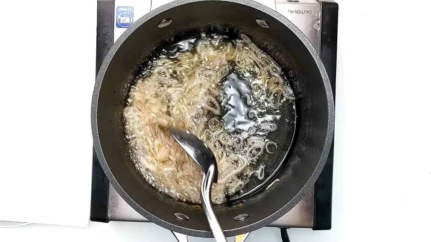 s to become nicely golden brown. Once browned and crisp, remove from the oil and drain on a paper towel.