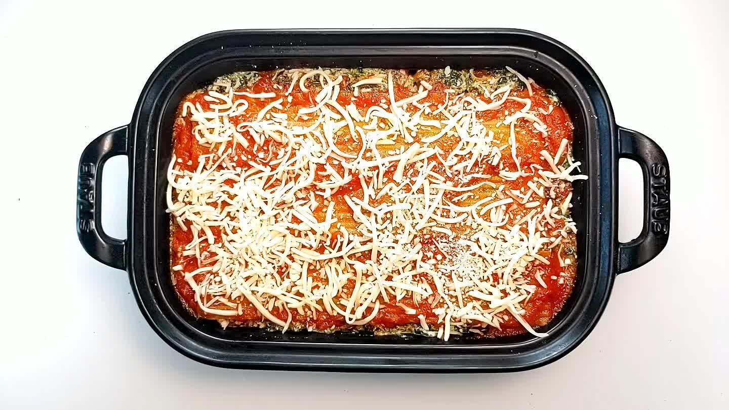 under the lid or foil will help soften the noodles! Bake the lasagna for about 40 - 50 minutes or until the noodles are soft. You may need to press the noodles down into the sauce partway through cooking if they are bending out of the sauce or just not fully submerged. Next, remove the lid or the foil and bake for another 10 minutes to brown the cheese on top.