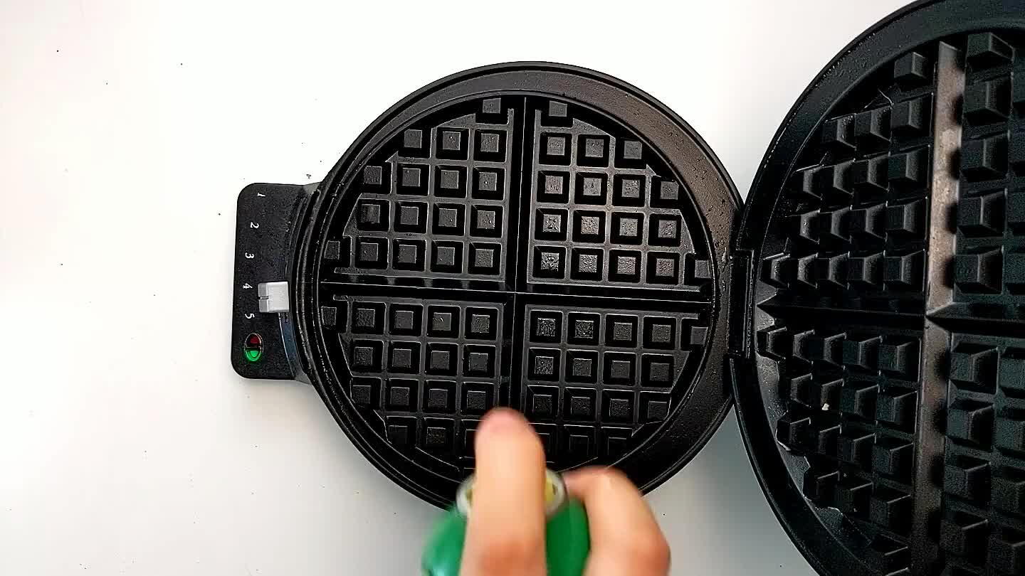 center of the iron. Close the top and cook for about 3-5 minutes or until waffle is browned and cooked through.