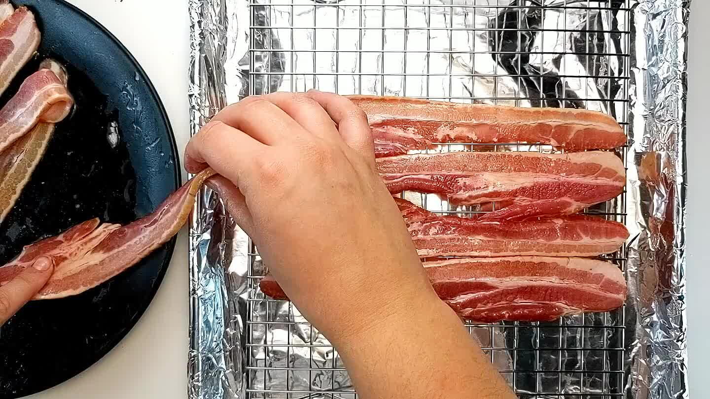 eet lined with foil. The wire rack will prevent any maple syrup from burning on the bacon.