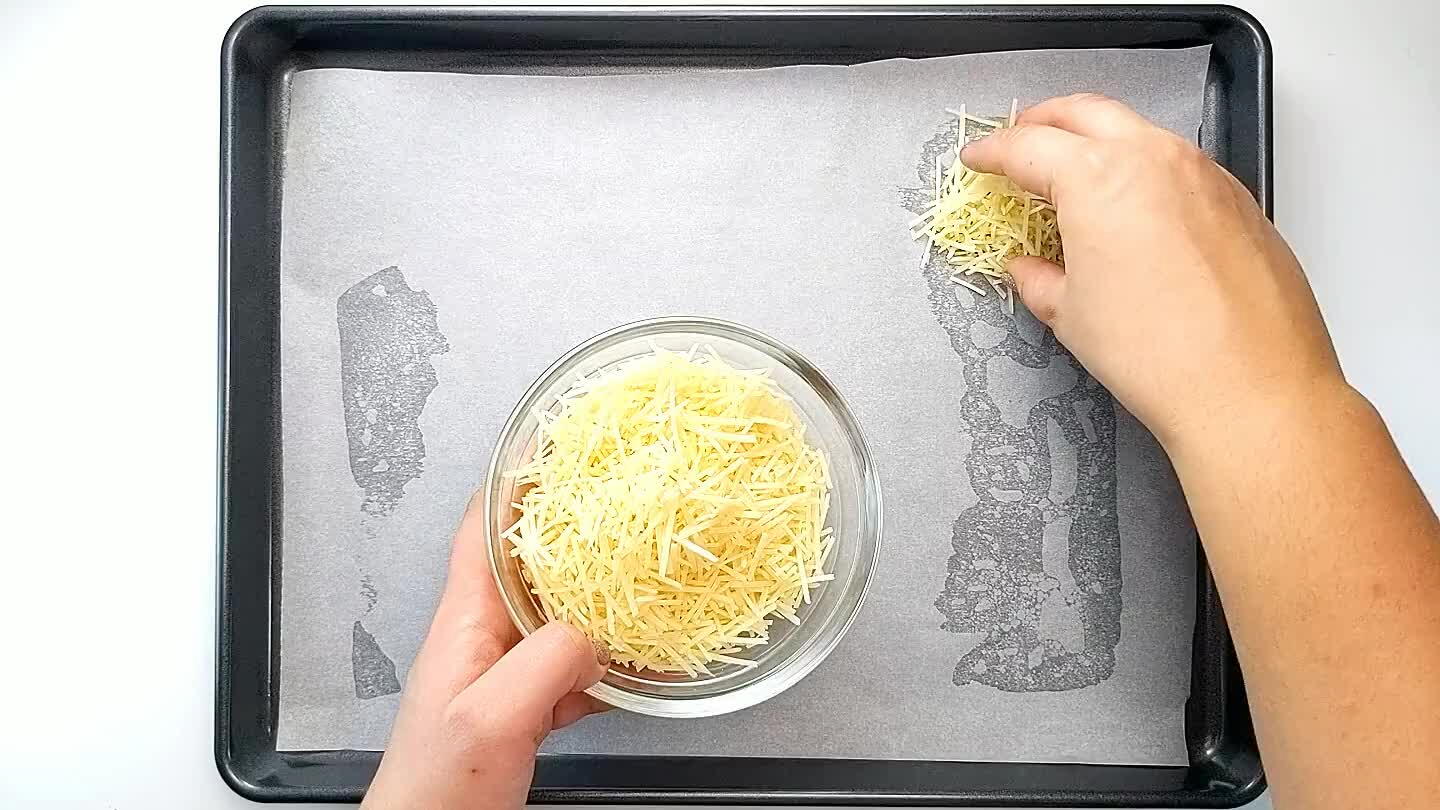 ches in diameter. Keep the piles high rather than spread out since the cheese will melt into the right shape. Keep 2-3 inches between the piles of cheese.