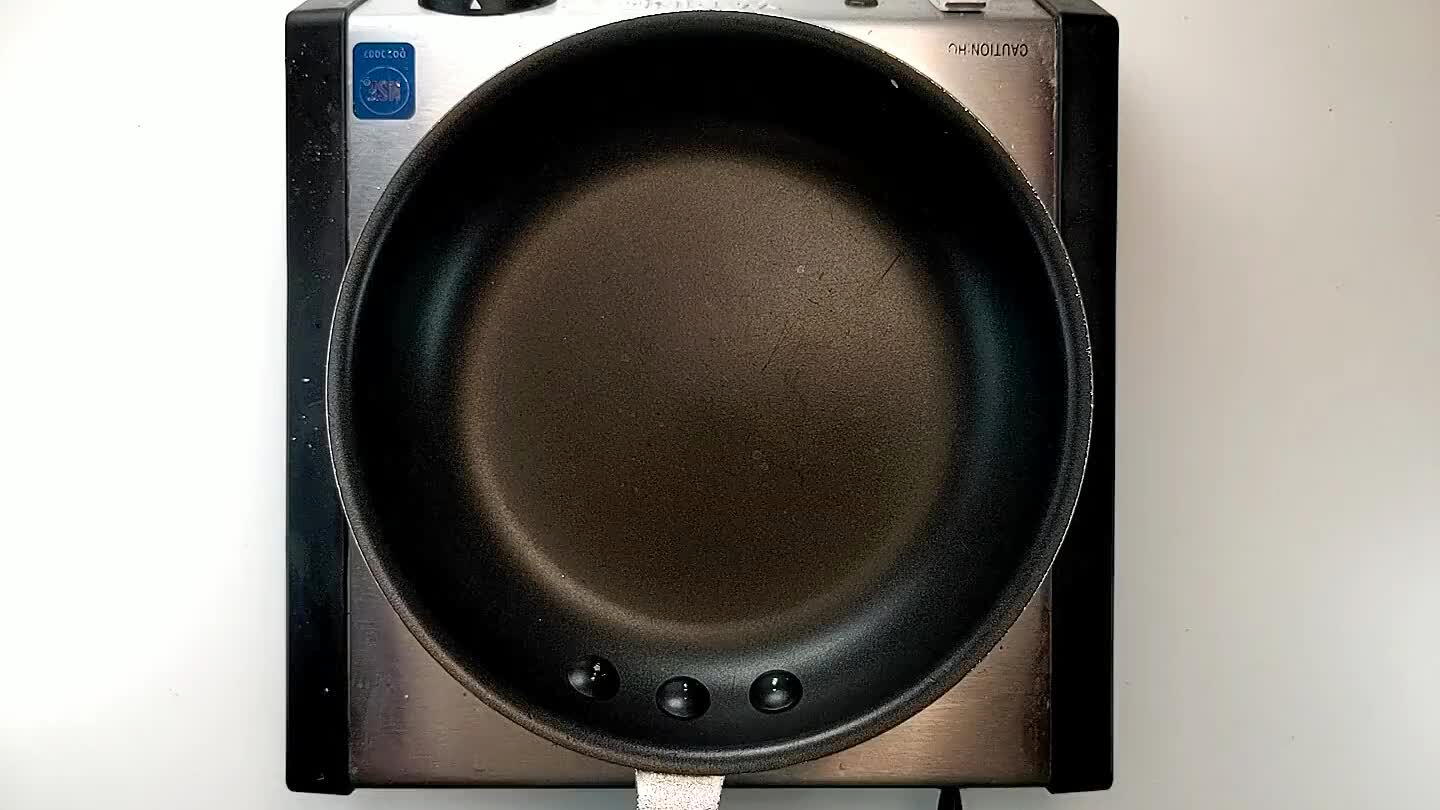 let over medium low heat. Top with a lid to begin the melting process. Slowly heat the cheese until it starts to melt completely. You may decide to drain off some of the grease.