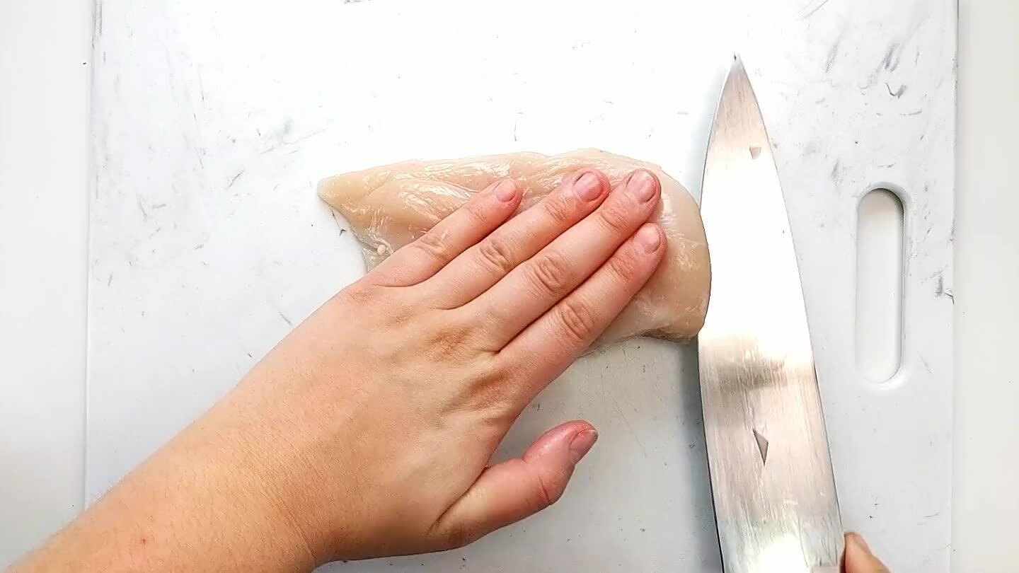 e chicken breast keeping your fingers out of the way and slice through the breast starting at the thick end and gliding through to the point.