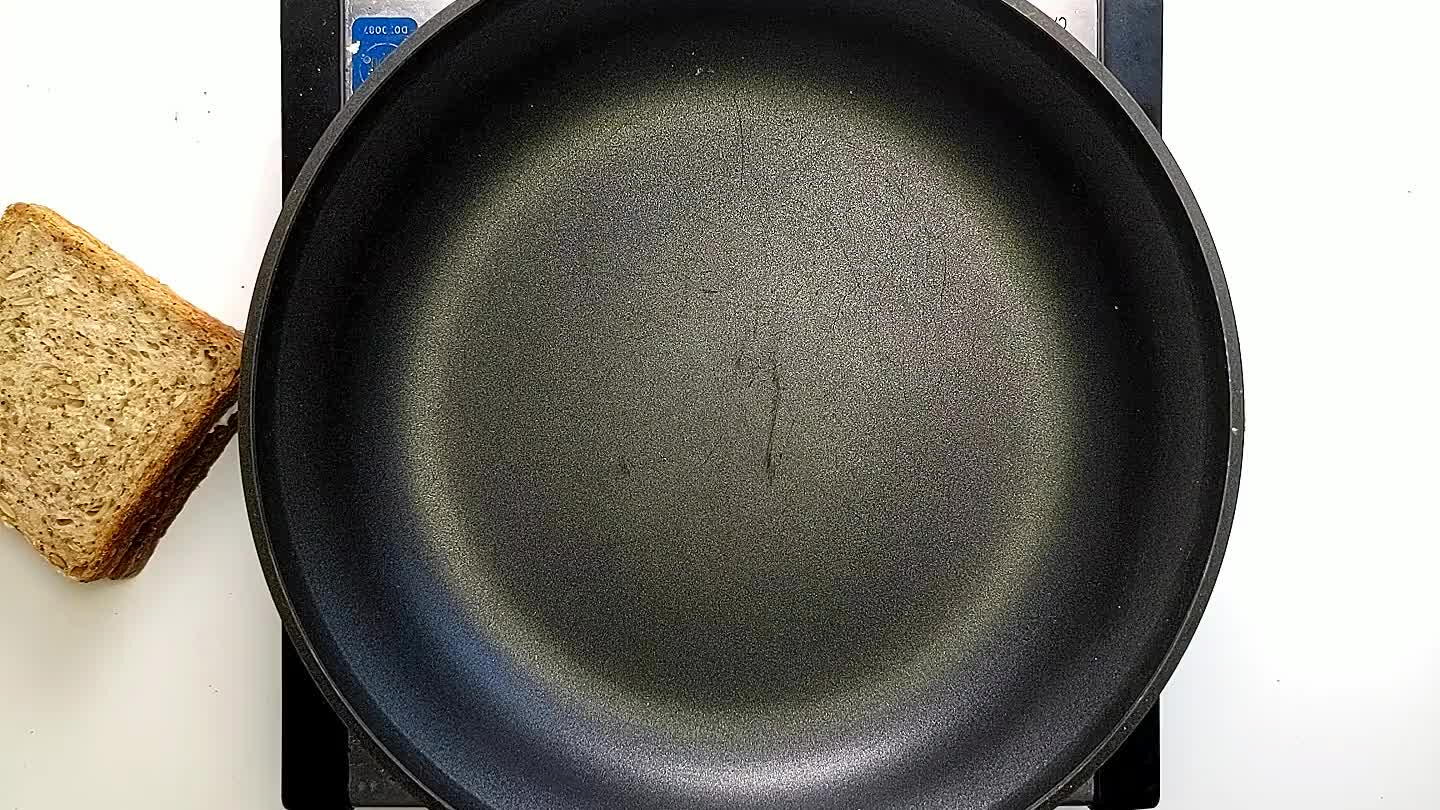 e sandwich into the skillet and add a lid. This will help the cheese melt.