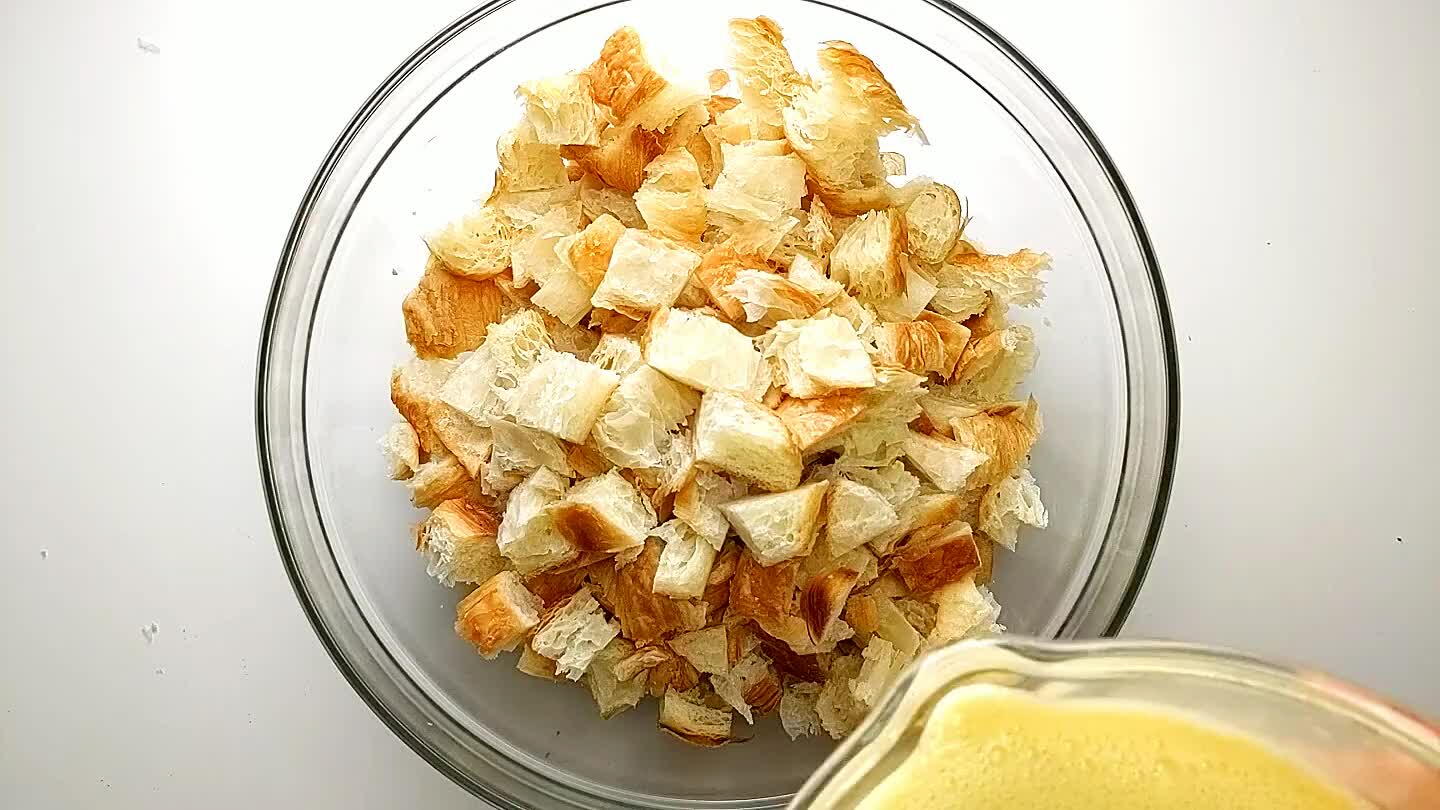 he top. Stir and let the custard soak into the croissants for a few minutes.
