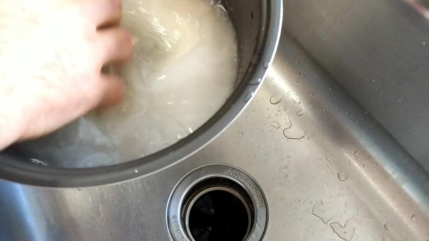 pour away the cloudy water without losing any rice grains. Repeat until the water runs clear (3-7 cycles).